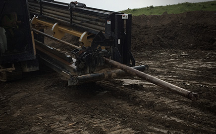 Vermeer 80x100 outfitted with RockEye hammer.